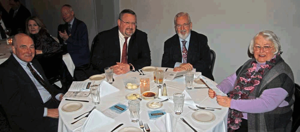 Ed Mitchell, Charles Greevy IV, Charles Greevy III and Gloria Greevy