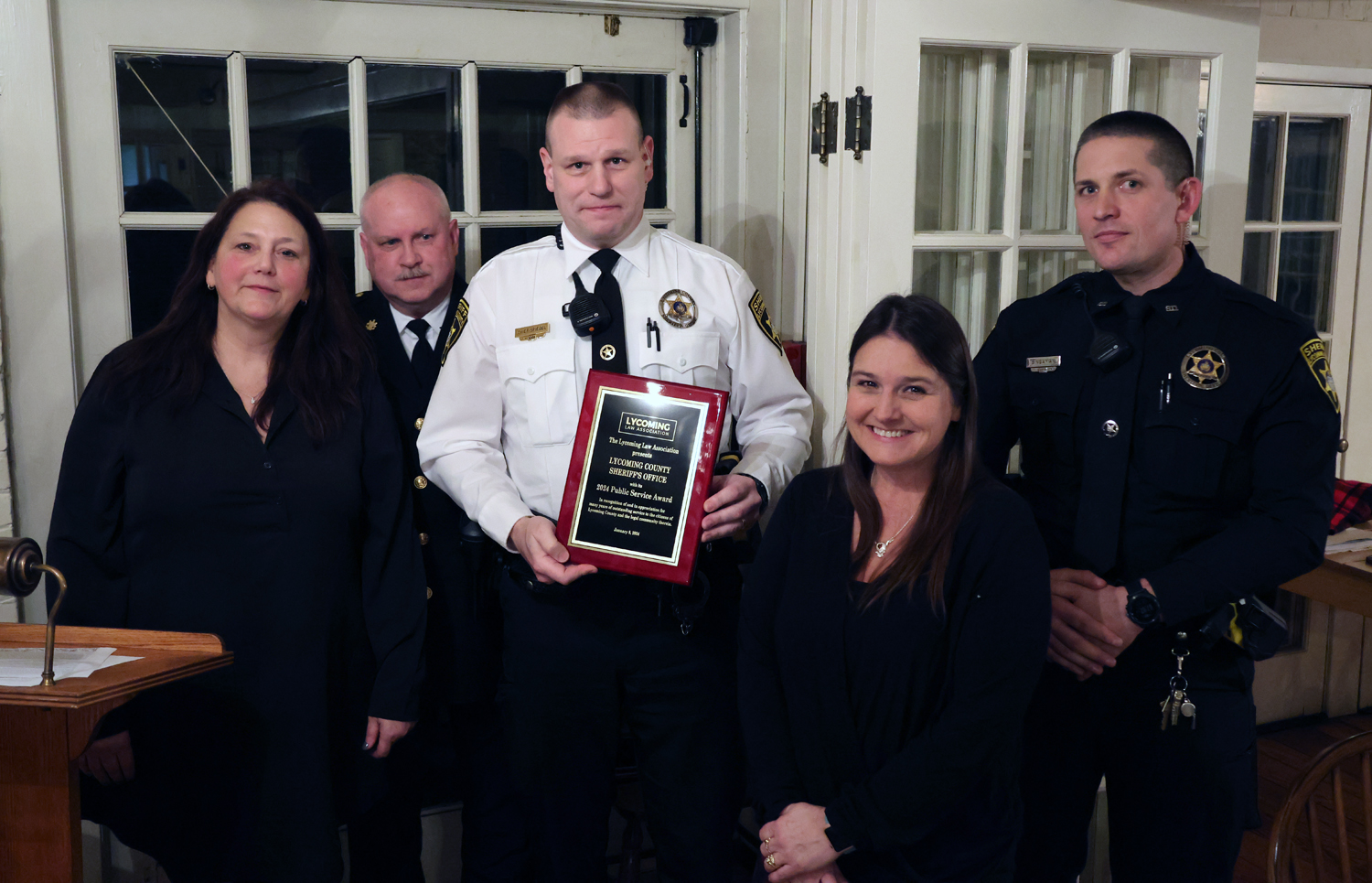 President McCoy with Sheriff Mark Lusk, Chief Eric Spiegel, Deputy Lucas Bingaman and office clerk Jennifer Hartley