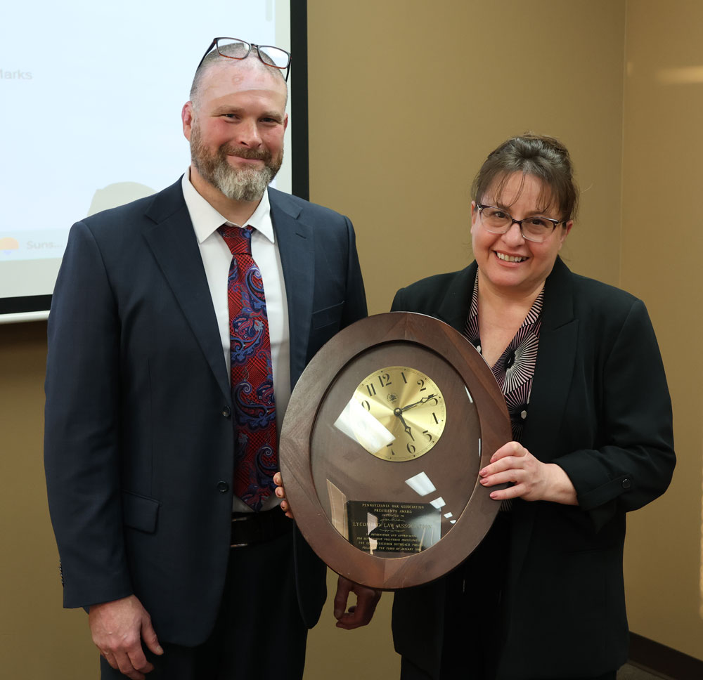 Judge Gardner passes the clock to new President Jeana Longo