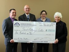Pro bono award funds presented to St. Anthony's Center