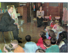 District Attorney Reads to Children