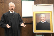 Carlucci Portrait Presented to Court